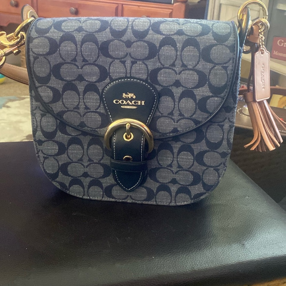 Denim coach bag.